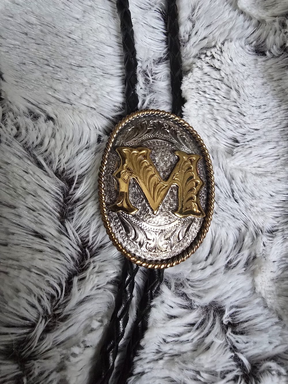 Vintage Montana Silversmiths Gold and Silver 'M' Oval Western Bolo Tie - Black